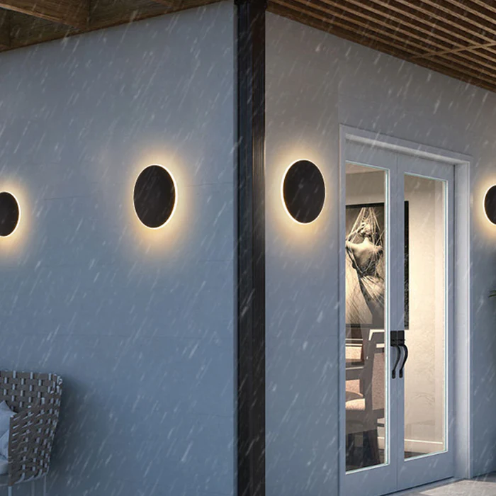Minimalistyczna okrągła lampa LED na ścianę z metalu do użytku zewnętrznego