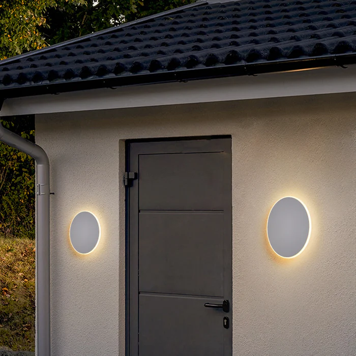 Minimalistyczna okrągła lampa LED na ścianę z metalu do użytku zewnętrznego